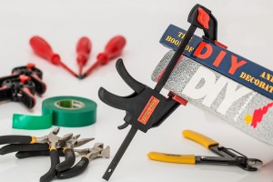 home improvement tools with "DIY" sign